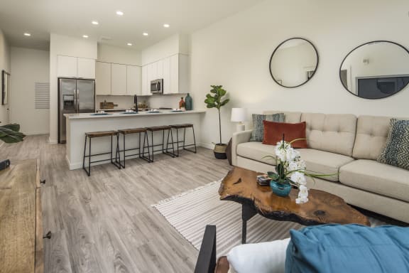 a living room with a couch and a table