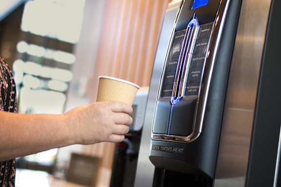 a person withdrawing money from an atm machine at Cycle Apartments, Fort Collins, 80525