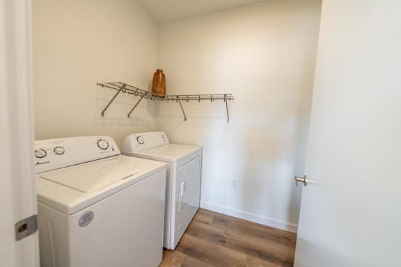 A laundry room with a washer and dryer.
