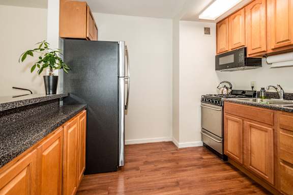 Kitchen with stove top oven at Garwood Gardens Apartments, New Jersey