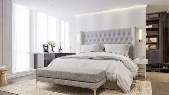 a bedroom with a bed and a nightstand