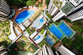 A bird's eye view of a city with swimming pools.