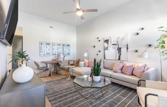 a living room with a couch and a table