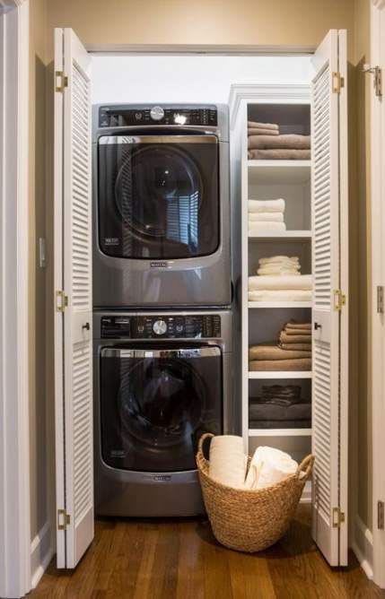 a small laundry room with a washer and dryer