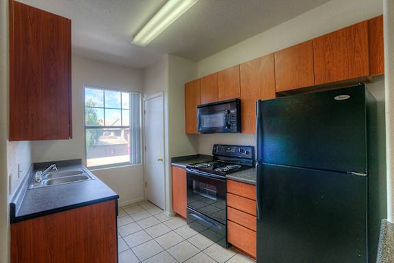 Kitchen with Cabinets at San Clemente Apartments, Gilbert, AZ, 85297
