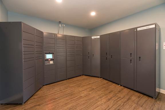 A row of brown lockers are lined up in a room at Autumn Oaks Apartments, Roseville, CA, 95678