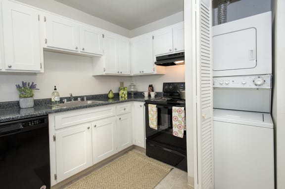 Kitchen &amp; Stackable Washer Dryer at River Pointe, California