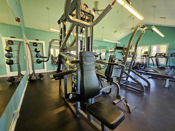 fitness center equipment machines at Sir Charles Court Apartments, Beaverton, OR