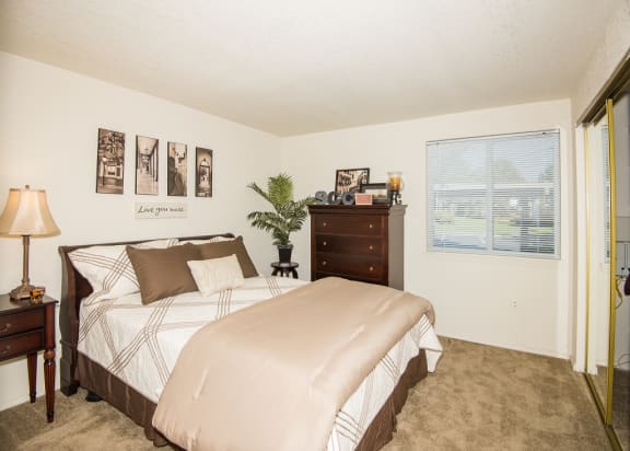 Master Bedroom &amp; Mirrored Closet  at Sir Charles Court Apartments, OR 97006