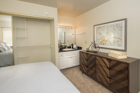 Model Upgraded Master Bedroom Vanity &amp; Closet at Zinfandel Village Apartments, CA 95670