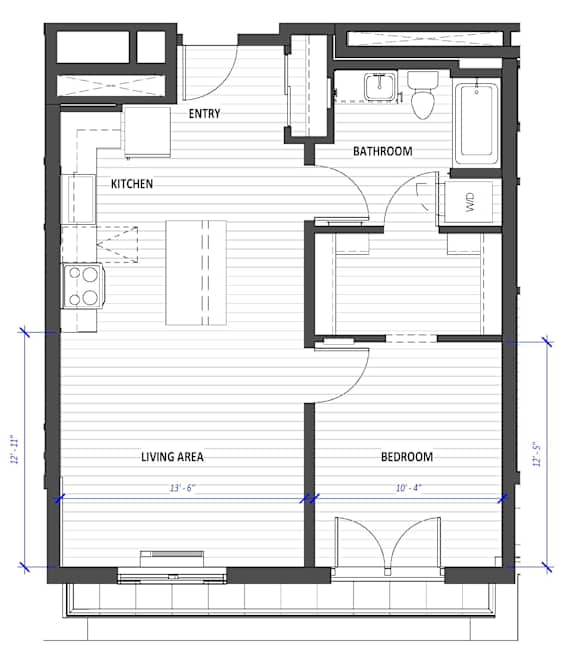 A floor plan of a house with a living area, kitchen, bathroom, and bedroom.