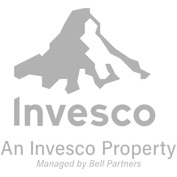 an innesco property logo with a mountain in the background