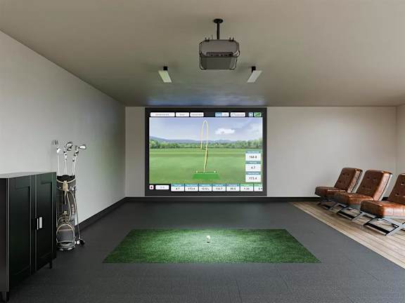Indoor golf simulator room with putting green at Garden at 3Roots Apartments, San Diego, California