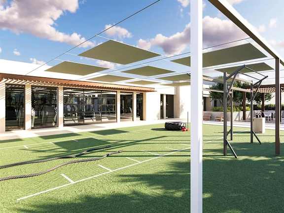 Outdoor fitness area with turf and shade canopies at Garden at 3Roots Apartments, San Diego, CA 92126