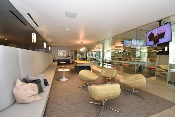 Recreation room with pool table and swivel chairs at 360 Luxury Apartments, San Diego, 92122