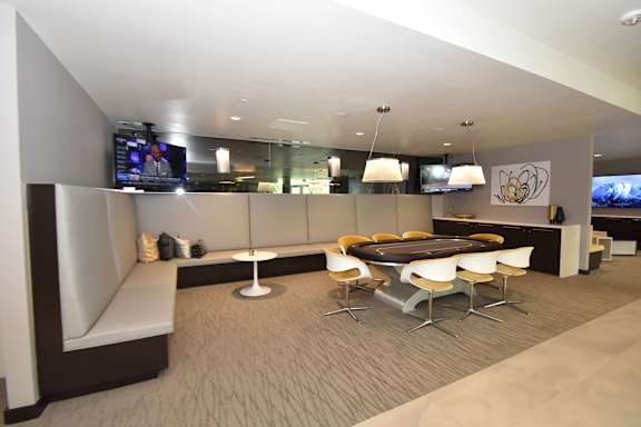 Lounge area with banquette and dining table at 360 Luxury Apartments, San Diego, 92122