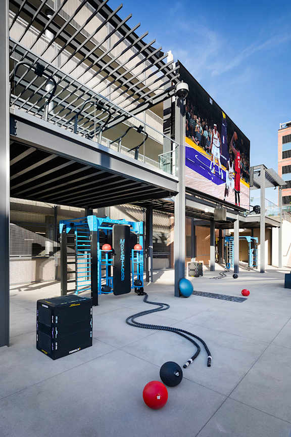 Outdoor fitness area with battle ropes and equipment at 360 Luxury Apartments, San Diego, CA
