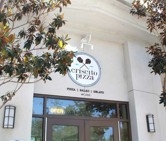 Criscito pizza restaurant entrance with landscaping at Torrey Gardens Apartments, San Diego, 92130
