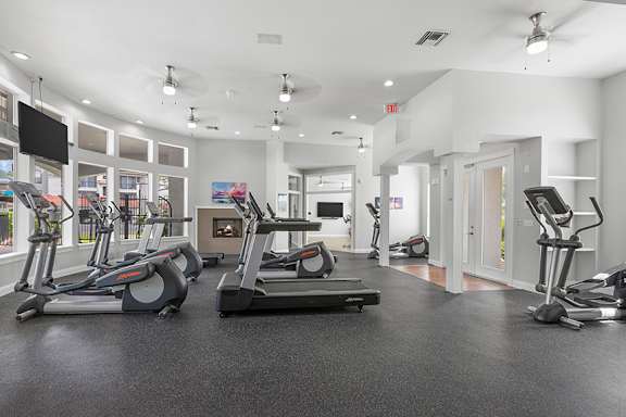 Innovative fitness center with cardio and spinning room - Egret's Landing Apartments