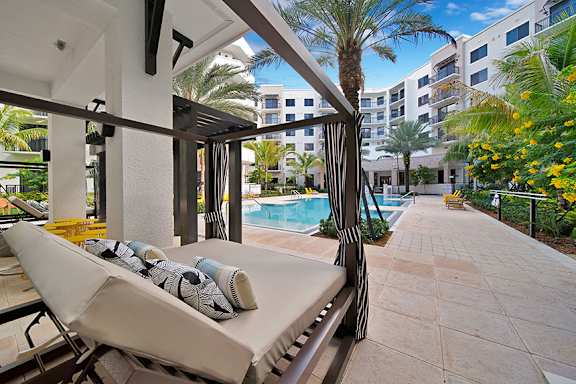 Poolside dining cabana area - The Remy Apartments