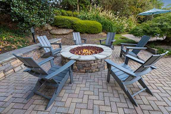 Fire pit with seating - Evergreen Lenox Park Apartments