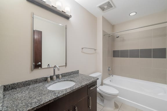 Garden-style tub with ceramic tile surround - Main 3 Downtown