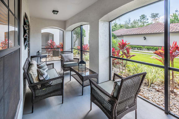 Delano at Cypress Creek French doors to private screened patio/balcony