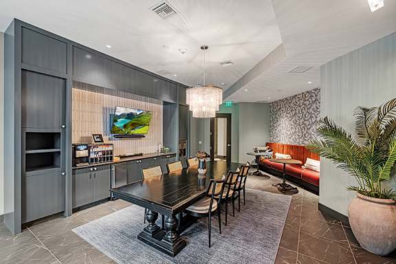 Resident clubhouse with  coffee bar and wine parlor - The Remy Apartments