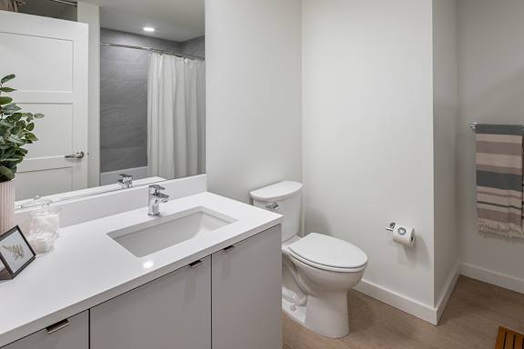 Tiled-in shower and bathtubs - Willow Apartments