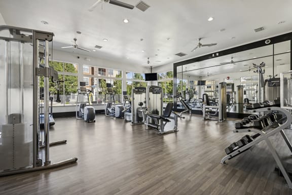 Fully-equipped resident fitness center - Acadia at Cornerstar Apartments