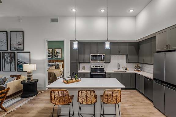Quartz countertops in kitchens - The Remy Apartments