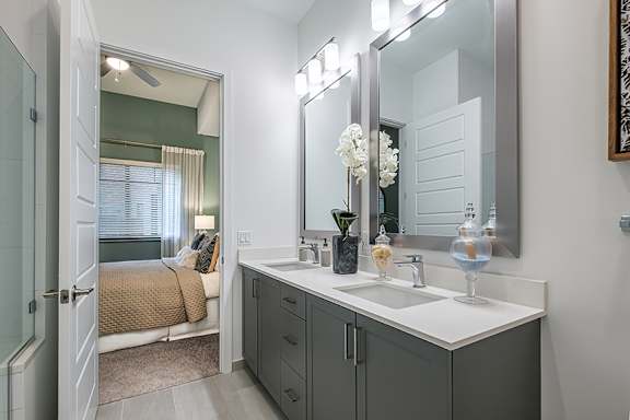 Quartz countertops in bathrooms - The Remy Apartments