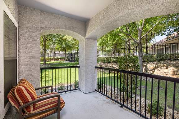 Spacious patio or balcony in every unit - DeLayne at Twin Creeks