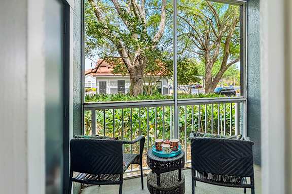 Screened-in patios and balconies - The Colony at Deerwood Apartments