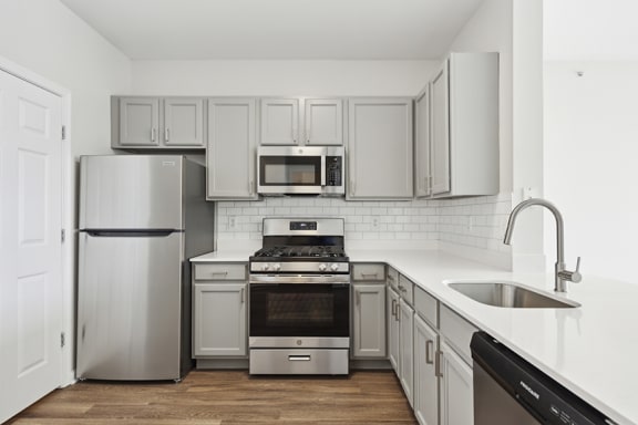 Stainless steel appliances in select units - Avenel at Montgomery Square