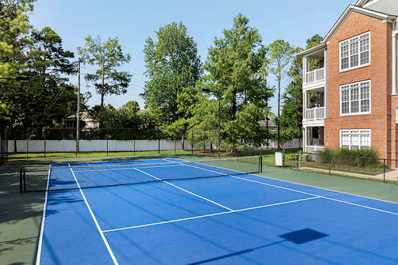 Lighted tennis courts - Belle Harbour Apartments