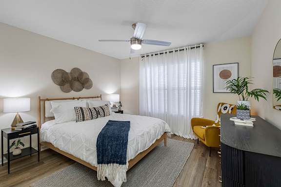 Ceiling fans in all bedrooms - The Colony at Deerwood Apartments
