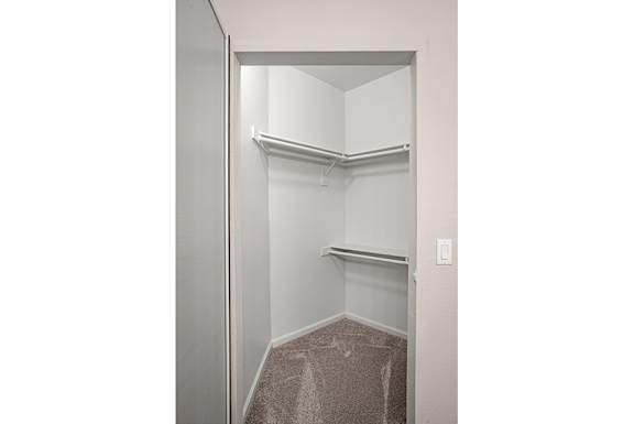 Spacious walk-in closets - Arrowhead Landing Apartments