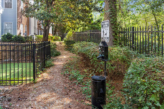Pet waste station in dog park - Evergreen Lenox Park Apartments