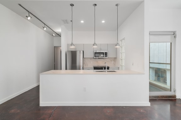 Pendant lighting over breakfast bar* - Main 3 Downtown