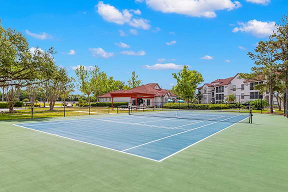 Lighted tennis court - Egret's Landing Apartments