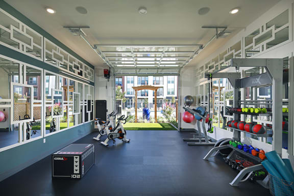 Indoor/outdoor yoga and spin room - NOVA at Green Ranch