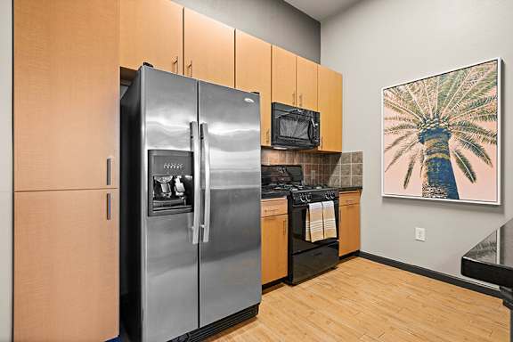 Kitchen with upgraded appliances - Foothills at Old Town Apartments