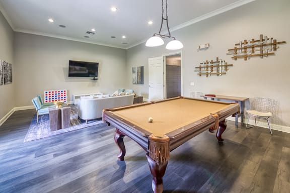 Courtney Station Apartments - Billiard room and social lounge with TVs