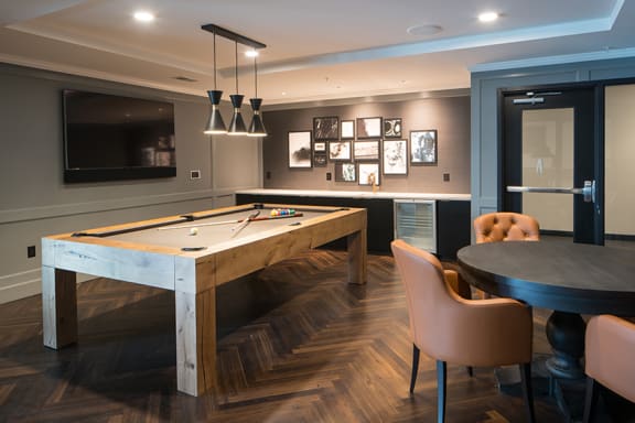 Resident clubhouse game room with billiards table - Onyx Edina