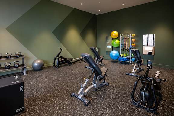 State-of-the-art fitness center with workout pads - Brentford at the Mile