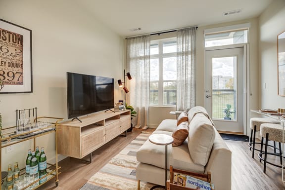 Wood-style flooring in kitchen and living rooms - BLVD at Revere Beach