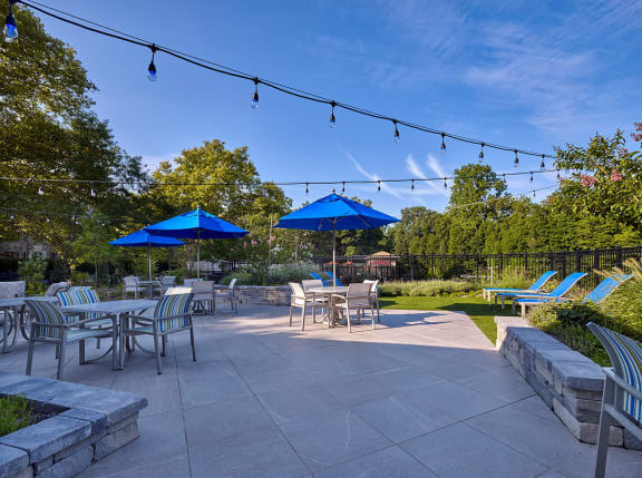 Hill House courtyard with seating, BBQ grills and a gazebo