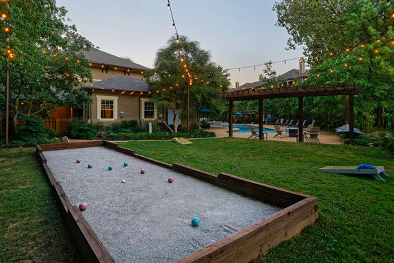 The Estates at River Pointe outdoor recreation area with bocce ball and beanbag toss