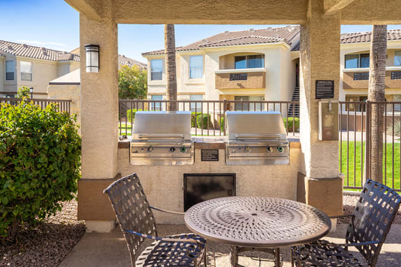Poolside BBQ area - Arrowhead Landing Apartments